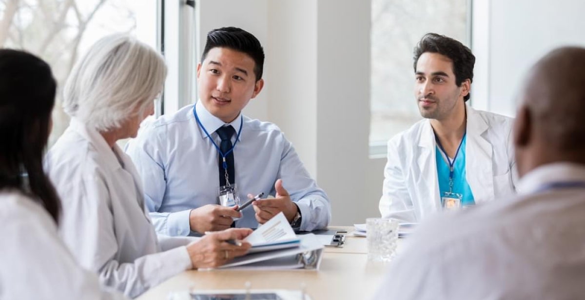 Leaders in medical science having a group discussion