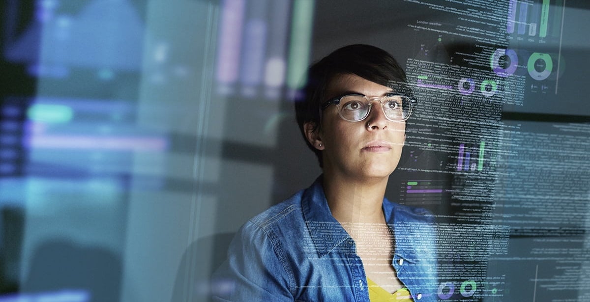 Cropped shot of a young lady looking through data.